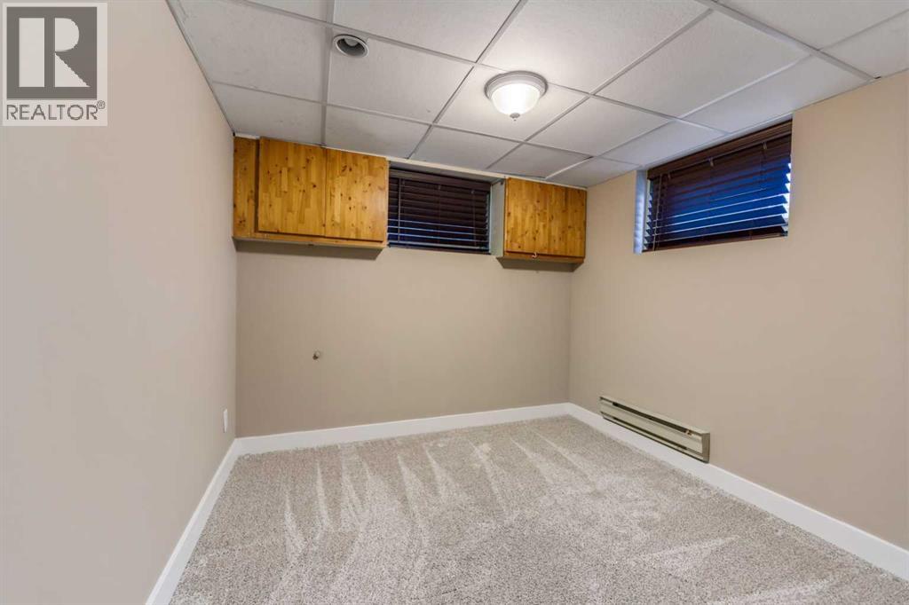 5923 Thorncliffe Drive Nw, Calgary, Alberta  T2K 2Z9 - Photo 24 - A2328930