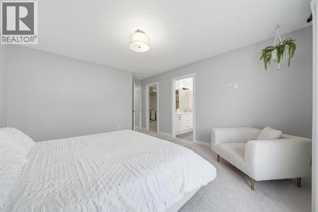 902 Bluerock Way SW, Calgary, Alberta  T2Y 0S5 - Photo 18 - A2332149