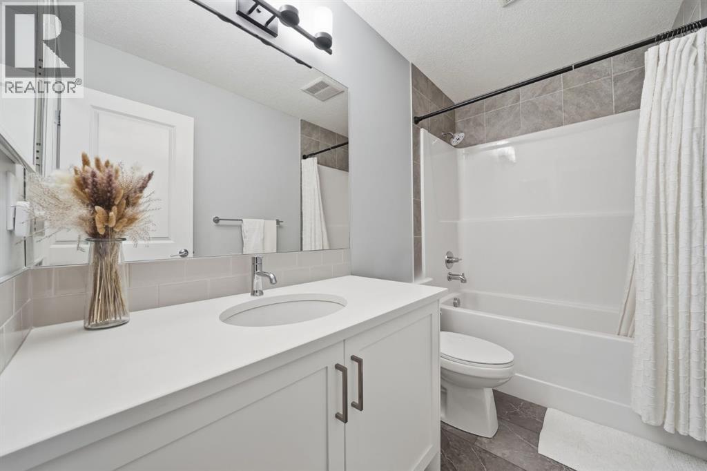 902 Bluerock Way SW, Calgary, Alberta  T2Y 0S5 - Photo 26 - A2332149