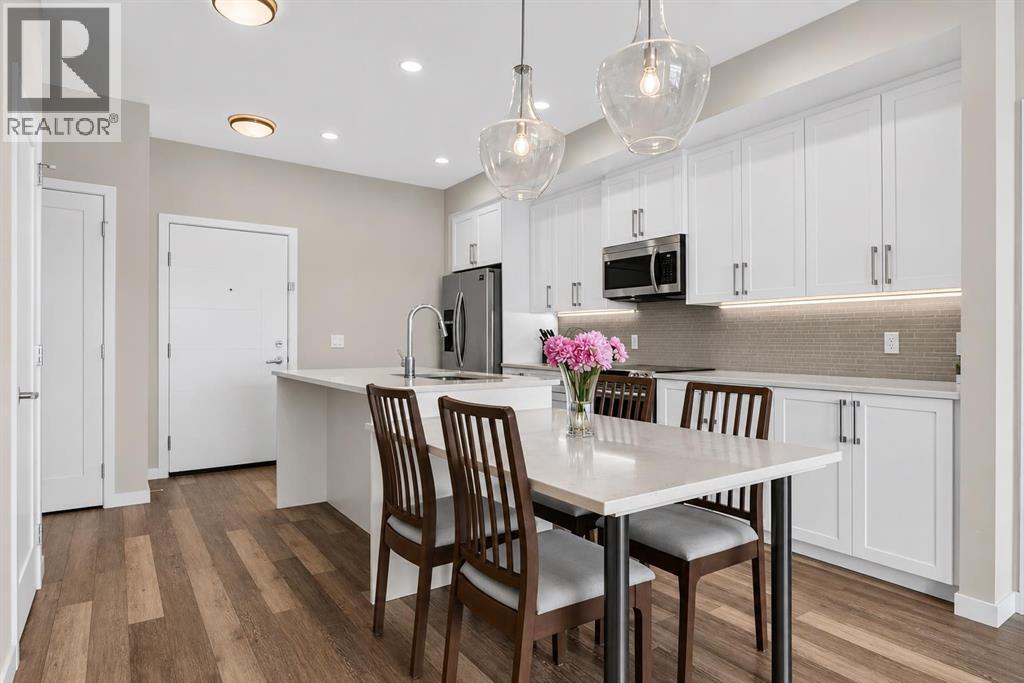 412, 8530 8a Avenue SW, Calgary, Alberta  T3H 6A7 - Photo 1 - A2323447
