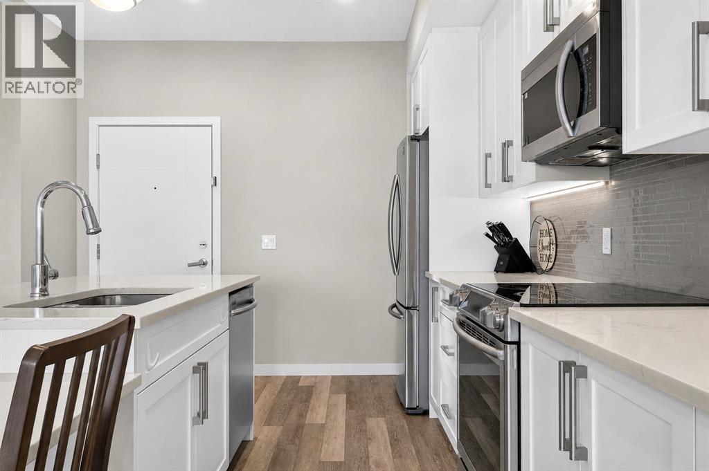 412, 8530 8a Avenue SW, Calgary, Alberta  T3H 6A7 - Photo 4 - A2323447