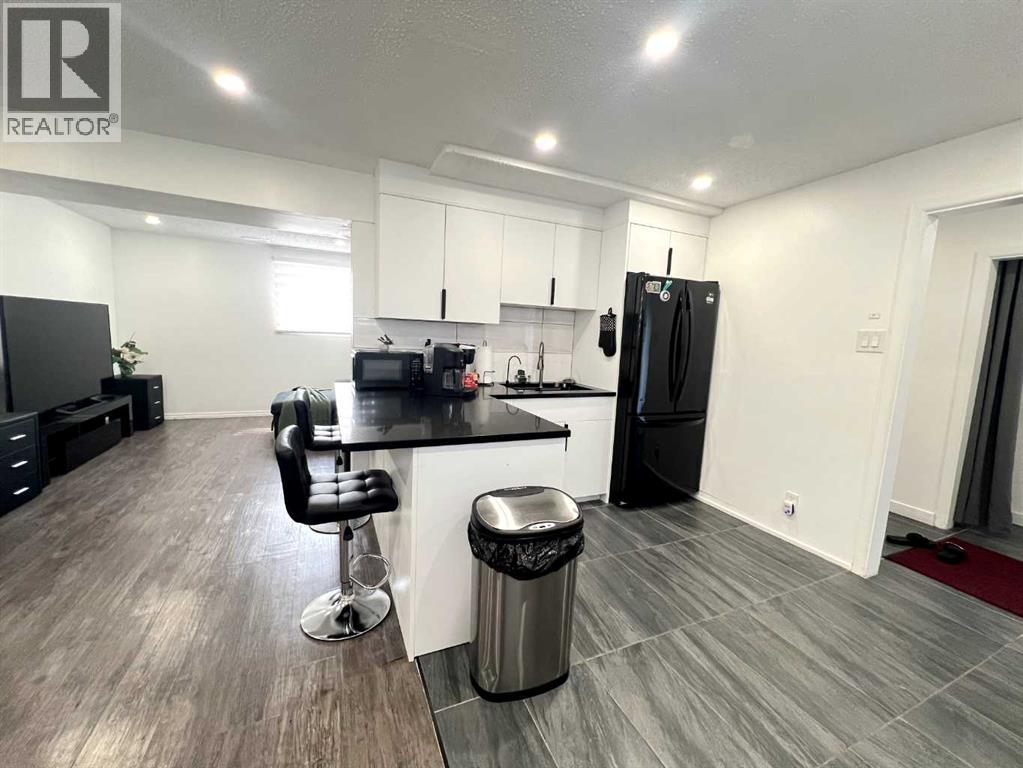 560 Northmount Drive NW, Calgary, Alberta  T2K 3J2 - Photo 24 - A2333027