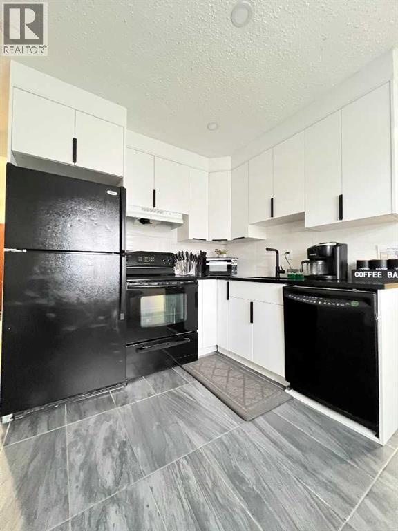 560 Northmount Drive NW, Calgary, Alberta  T2K 3J2 - Photo 6 - A2333027