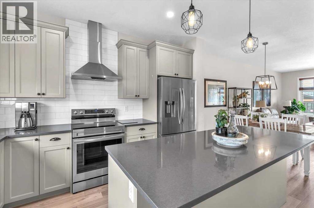 70 Haskayne Drive NW, Calgary, Alberta  T3L 0H1 - Photo 4 - A2325395