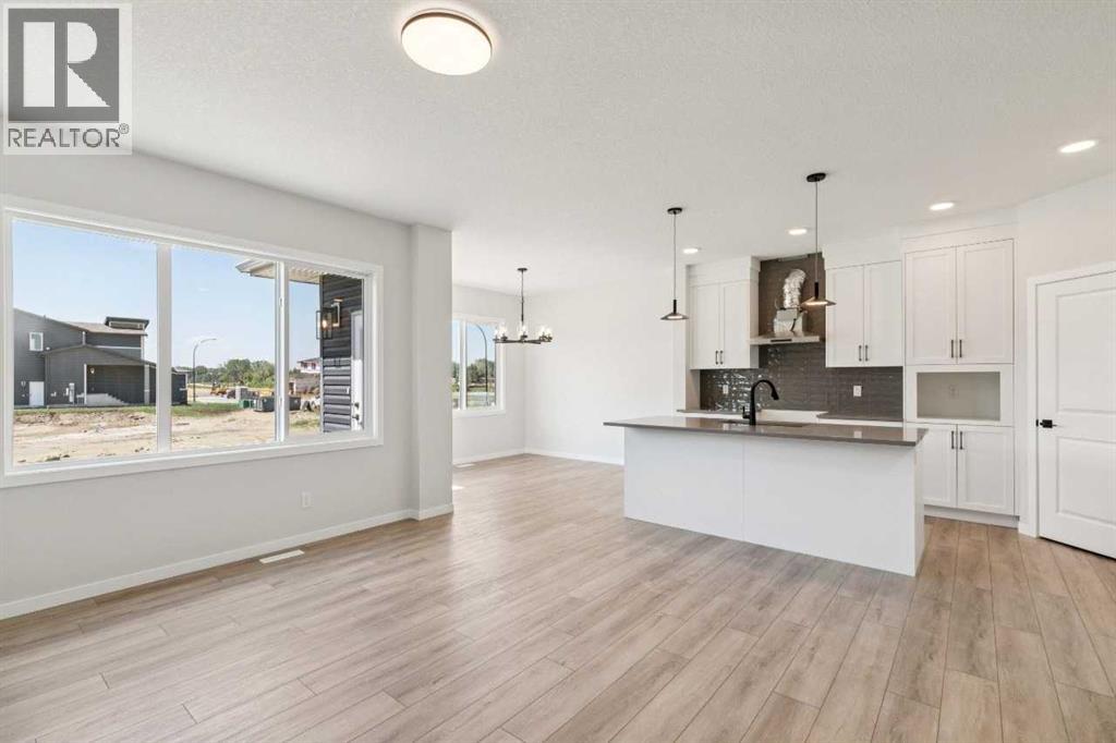 178 Clearwater Terrace, Chestermere, Alberta  T1X 2M5 - Photo 8 - A2304316