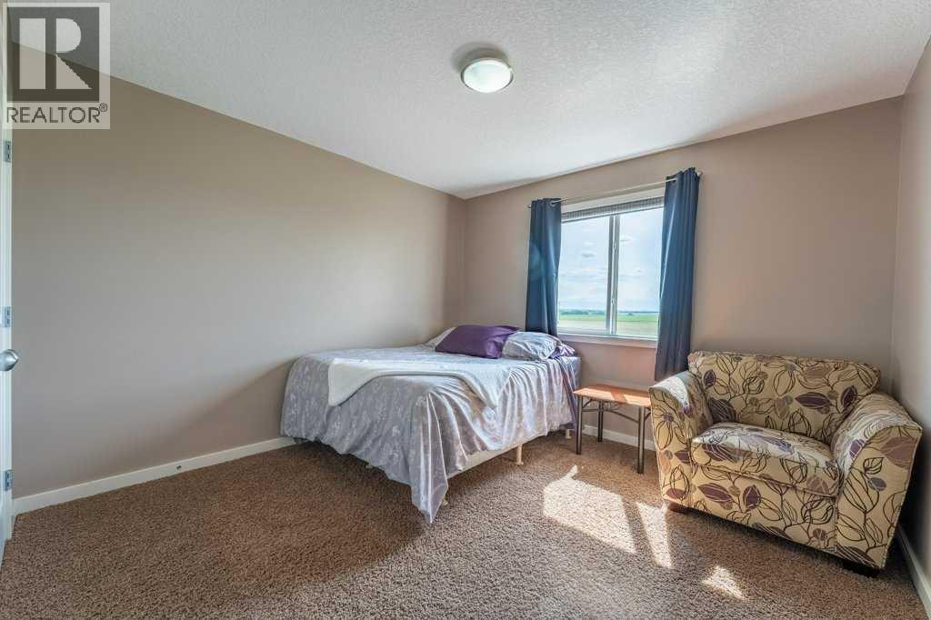 472 Sunset Link, Crossfield, Alberta  T0M 0S0 - Photo 33 - A2324153