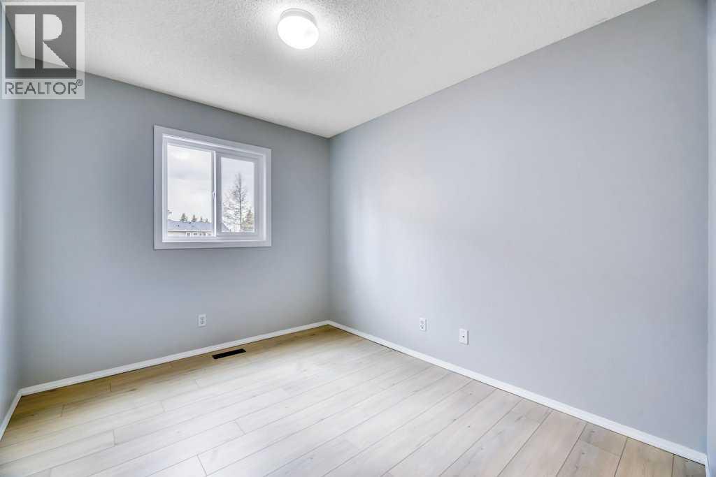 215 Hawktree Circle Nw, Calgary, Alberta  T3G 2Y6 - Photo 24 - A2305784