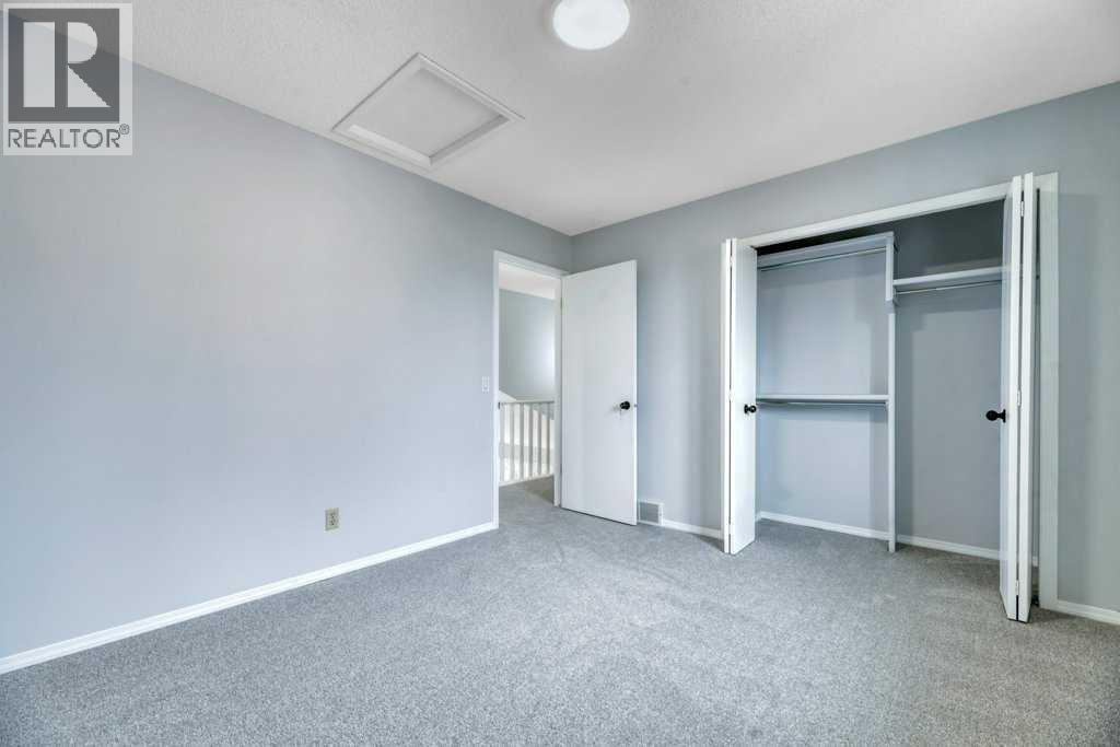 215 Hawktree Circle Nw, Calgary, Alberta  T3G 2Y6 - Photo 36 - A2305784