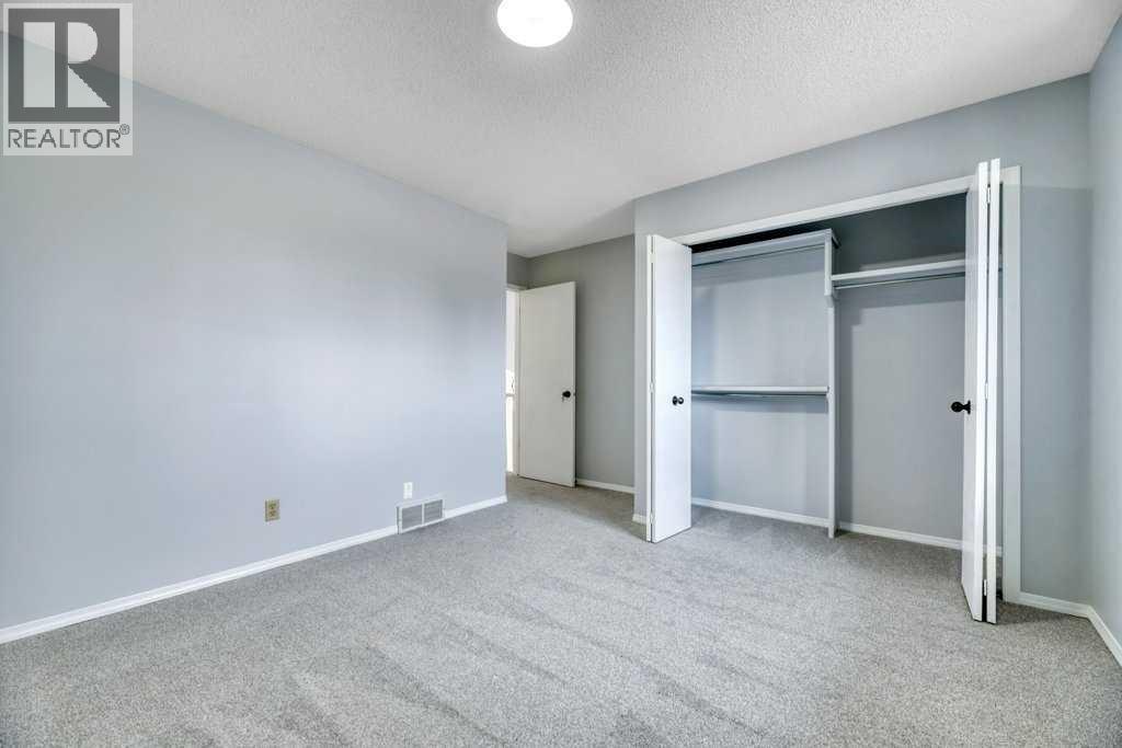 215 Hawktree Circle Nw, Calgary, Alberta  T3G 2Y6 - Photo 34 - A2305784