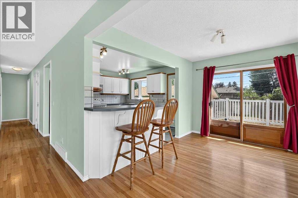7727 Bowcliffe Crescent NW, Calgary, Alberta  T3B 2S6 - Photo 11 - A2328949