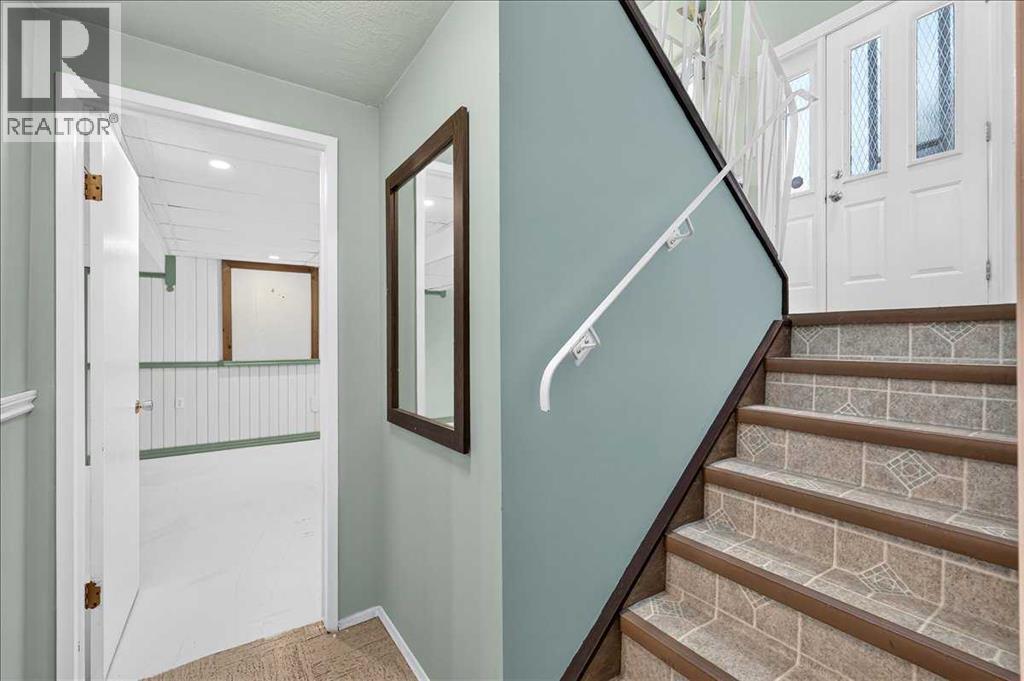 7727 Bowcliffe Crescent NW, Calgary, Alberta  T3B 2S6 - Photo 31 - A2328949