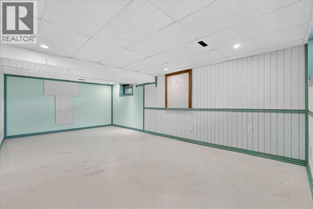 7727 Bowcliffe Crescent NW, Calgary, Alberta  T3B 2S6 - Photo 32 - A2328949