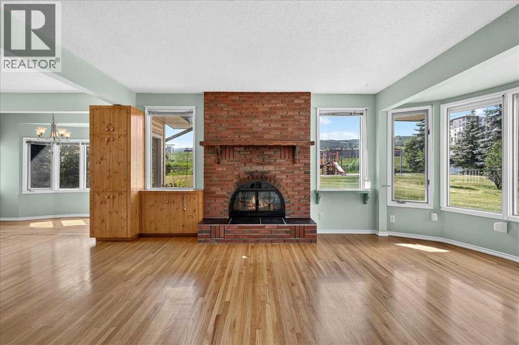 7727 Bowcliffe Crescent NW, Calgary, Alberta  T3B 2S6 - Photo 3 - A2328949