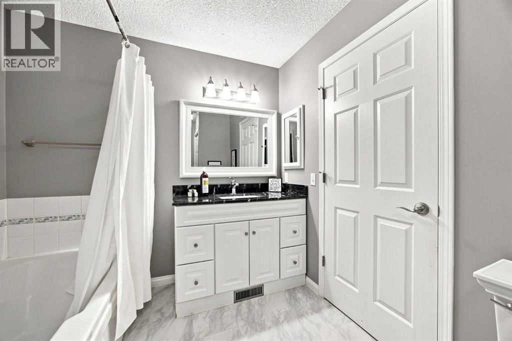 128 Sienna Park Green SW, Calgary, Alberta T3H 3N7 - Photo 23 - A2330020