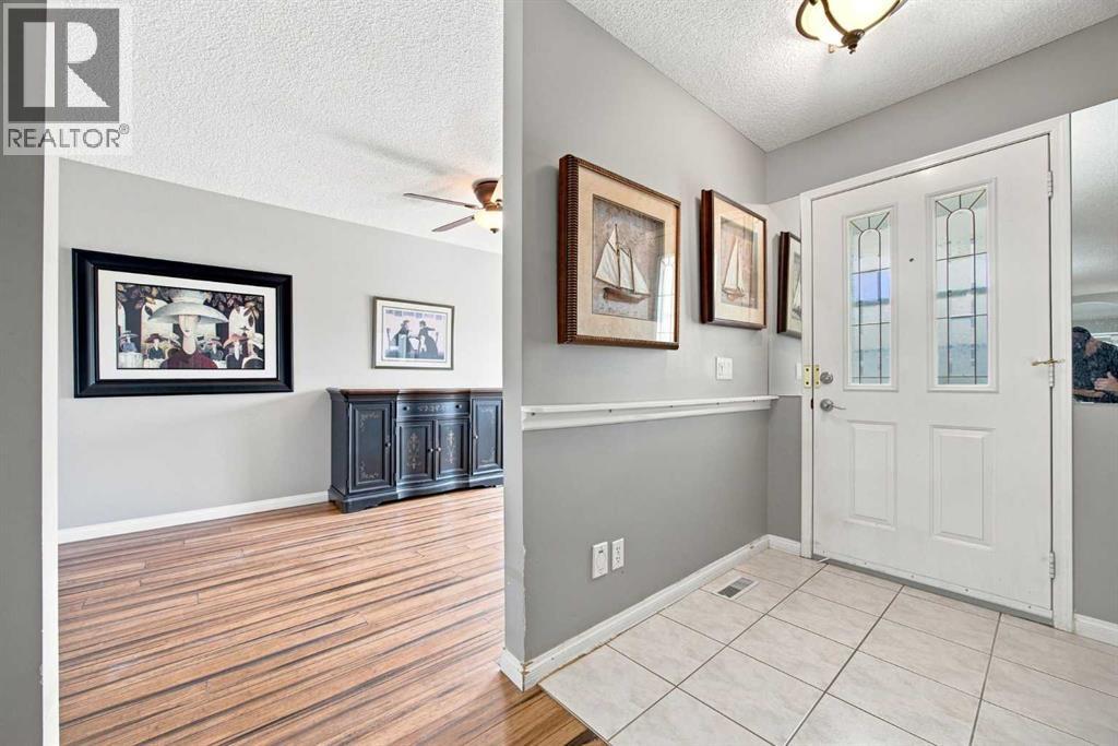 128 Sienna Park Green SW, Calgary, Alberta T3H 3N7 - Photo 4 - A2330020