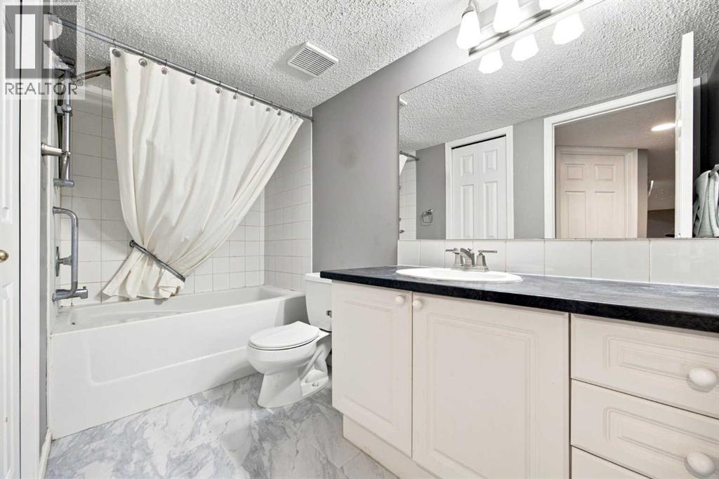 128 Sienna Park Green SW, Calgary, Alberta T3H 3N7 - Photo 33 - A2330020