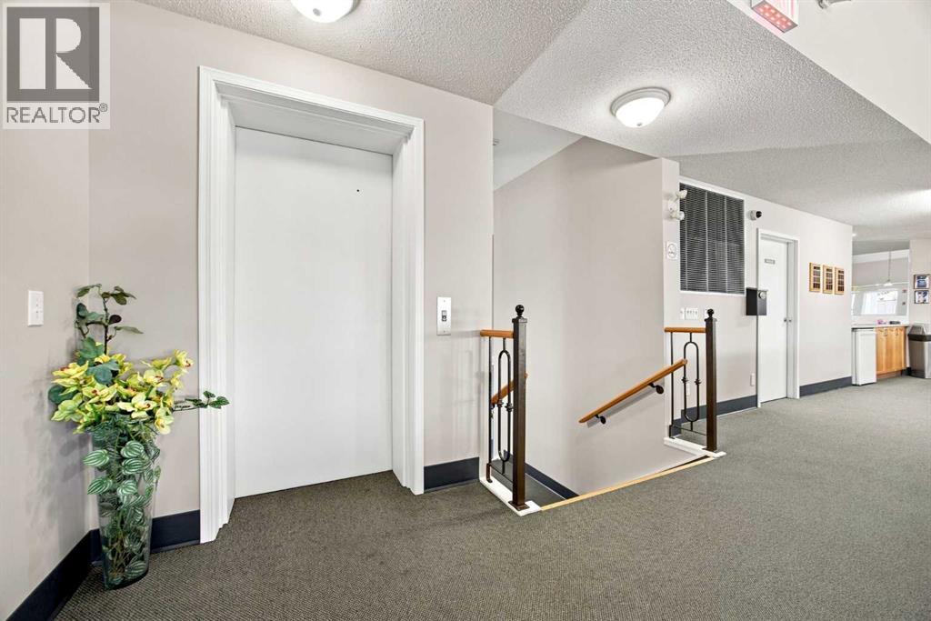 128 Sienna Park Green SW, Calgary, Alberta T3H 3N7 - Photo 39 - A2330020