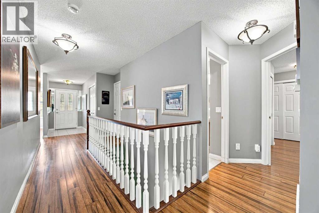128 Sienna Park Green SW, Calgary, Alberta T3H 3N7 - Photo 6 - A2330020