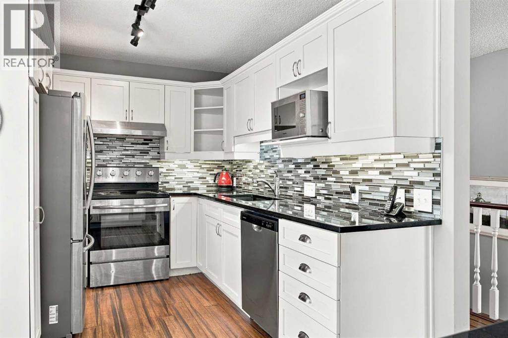 128 Sienna Park Green SW, Calgary, Alberta T3H 3N7 - Photo 15 - A2330020