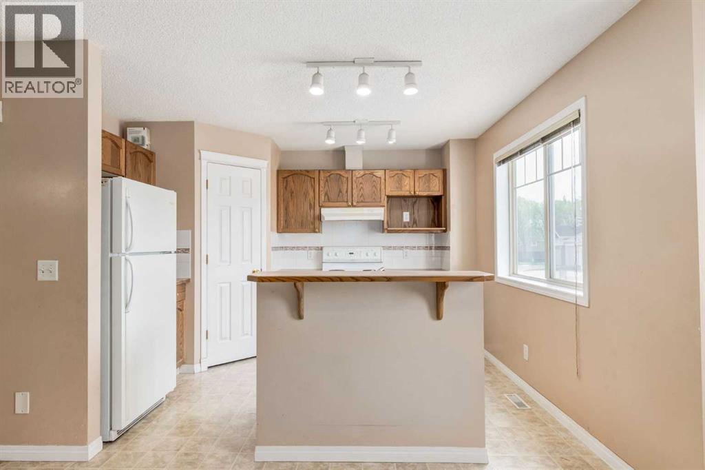 109 Hidden Creek Gardens Nw, Calgary, Alberta  T3A 6J4 - Photo 6 - A2321962