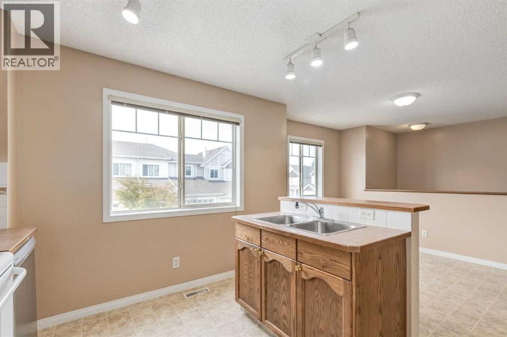 109 Hidden Creek Gardens Nw, Calgary, Alberta  T3A 6J4 - Photo 9 - A2321962
