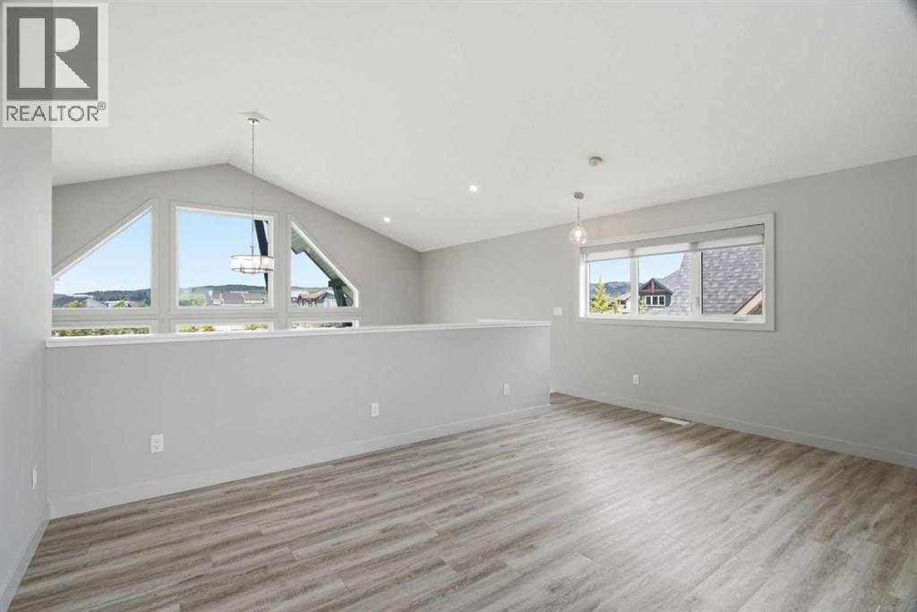 505 Cottageclub Bay, Rural Rocky View County, Alberta  T4C 0A2 - Photo 21 - A2320299