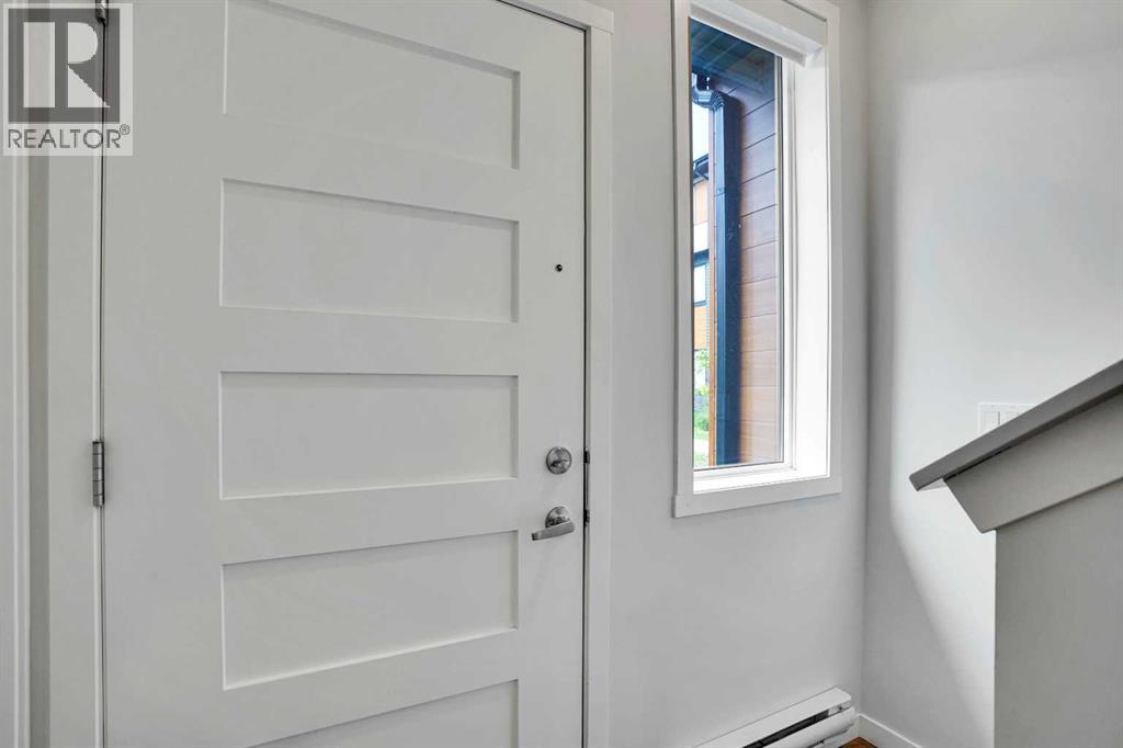 104 Corner Glen Circle NE, Calgary, Alberta T3N 2E2 - Photo 6 - A2322574