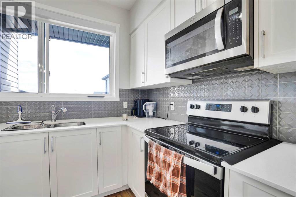 104 Corner Glen Circle NE, Calgary, Alberta T3N 2E2 - Photo 24 - A2322574