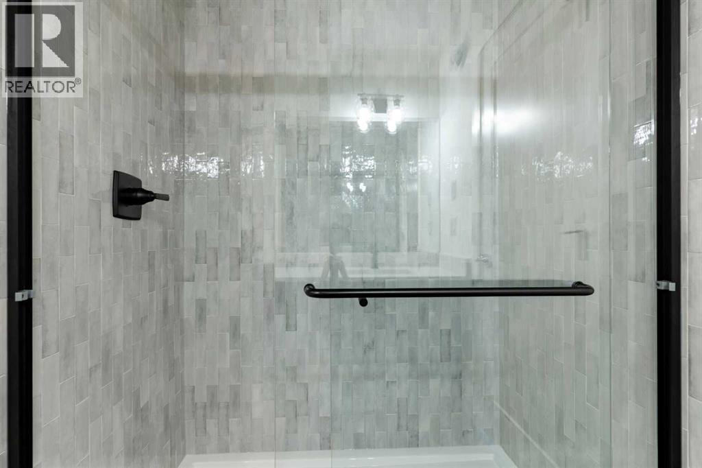 83 Heritage Manor, Cochrane, Alberta  T4C 3K8 - Photo 39 - A2333350