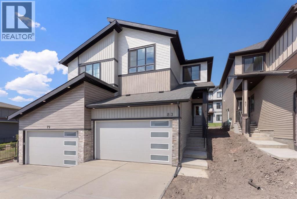 83 Heritage Manor, Cochrane, Alberta  T4C 3K8 - Photo 3 - A2333350