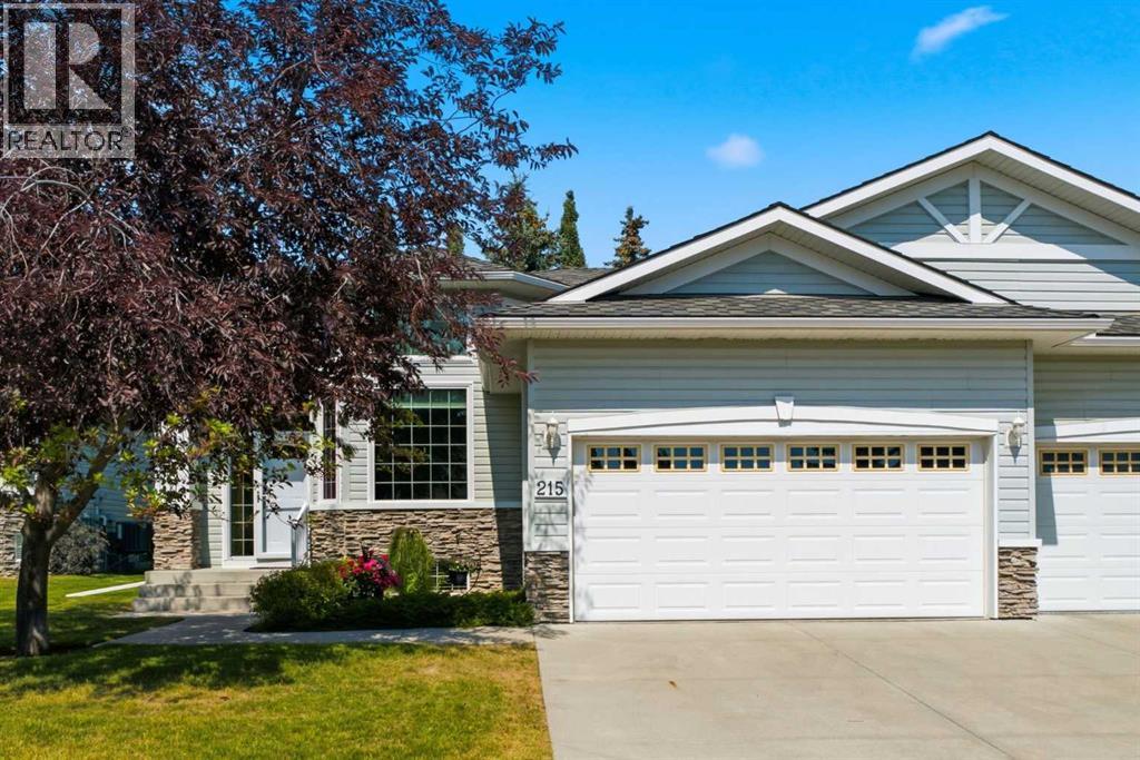 215 Rocky Ridge Villas NW, Calgary, Alberta  T3G 4R2 - Photo 2 - A2329725