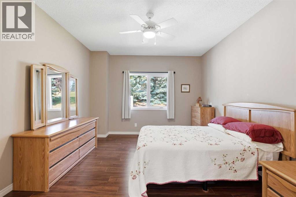 215 Rocky Ridge Villas NW, Calgary, Alberta  T3G 4R2 - Photo 19 - A2329725