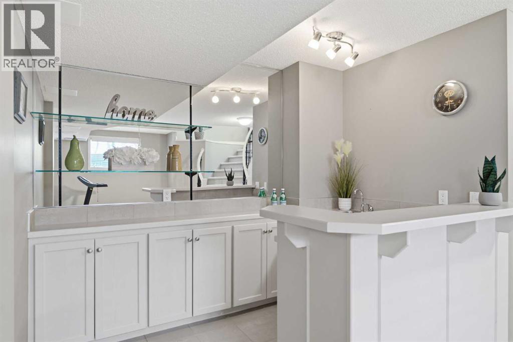 215 Rocky Ridge Villas NW, Calgary, Alberta  T3G 4R2 - Photo 34 - A2329725