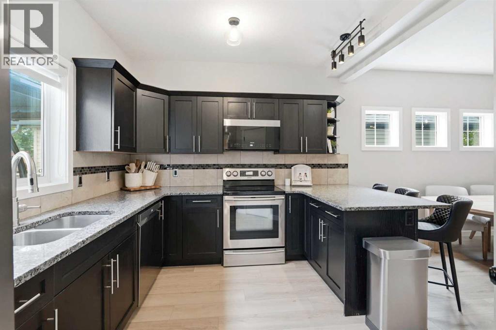 2518 Ravenswood View SE, Airdrie, Alberta  T4A 0J7 - Photo 9 - A2330198