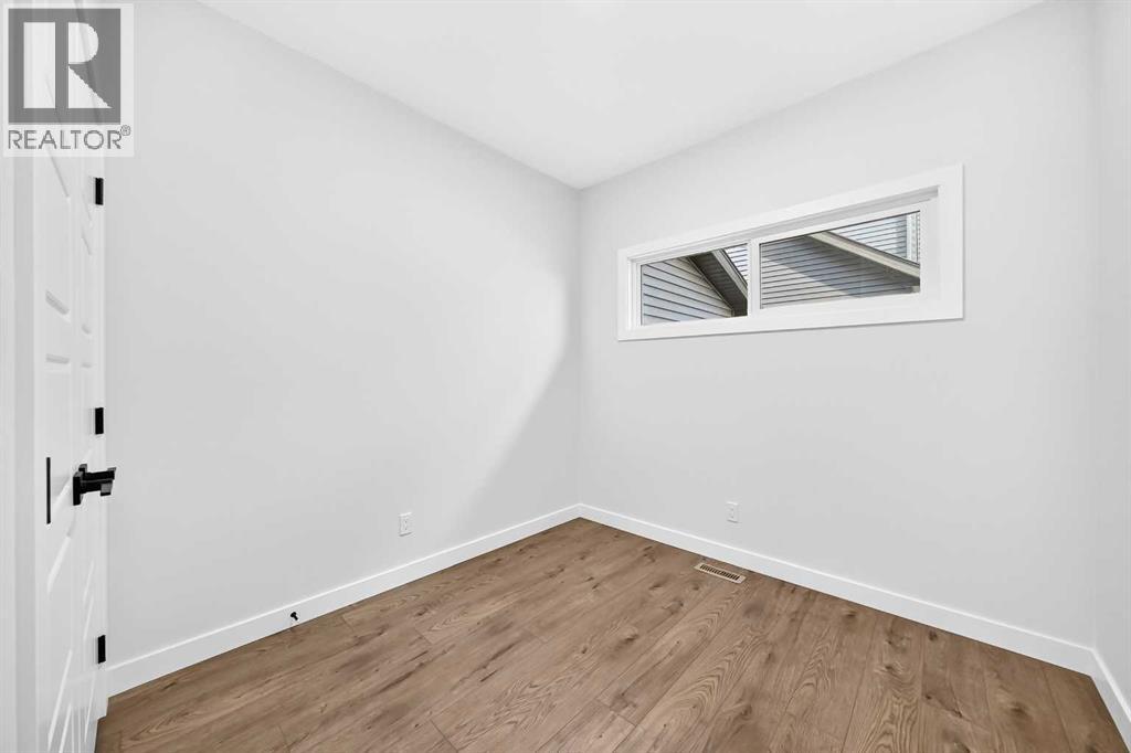 199 Langwell Common SE, Airdrie, Alberta  T4A 3R4 - Photo 5 - A2333766