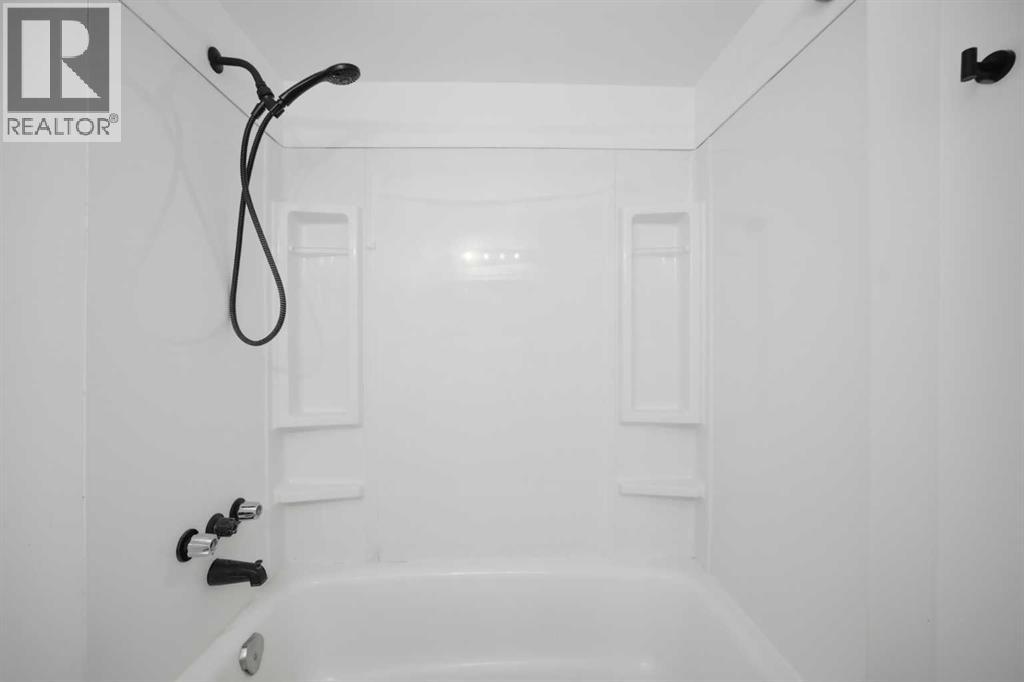 1004 Mckinnon Drive NE, Calgary, Alberta  T2E 7R8 - Photo 38 - A2329819