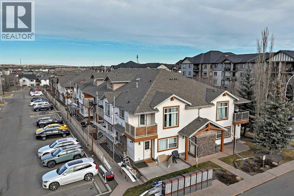 205, 20 Panatella Landing NW, Calgary, Alberta T3K 0K8 - Photo 1 - A2309288
