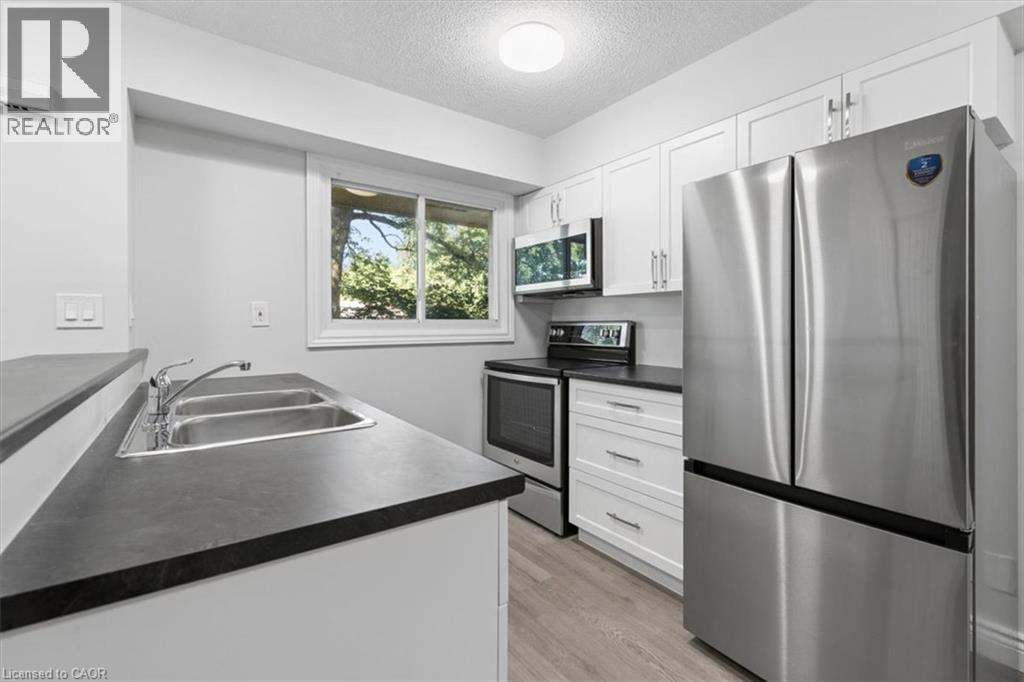 211 Veronica Drive Unit# 8, Kitchener, Ontario  N2A 2R8 - Photo 6 - 40852159