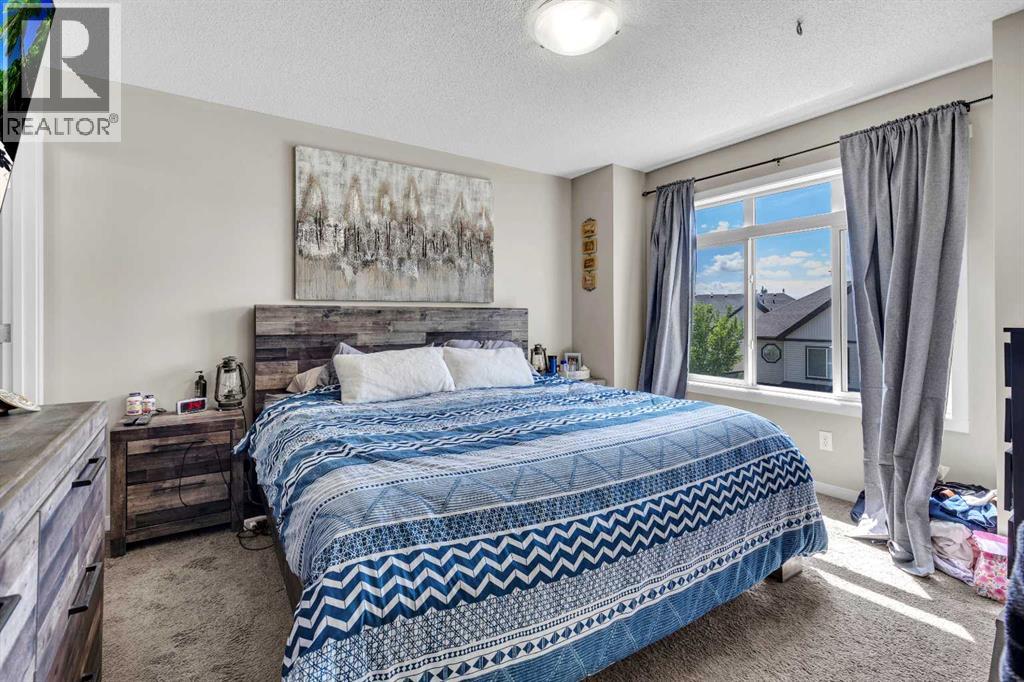 401 Copperpond Landing SE, Calgary, Alberta  T2G 1Z6 - Photo 5 - A2318569