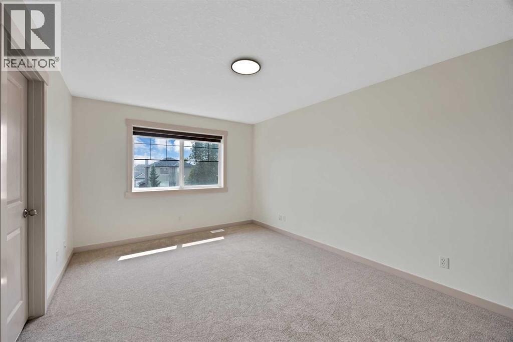 130 Panamount Road NW, Calgary, Alberta  T3K 0H6 - Photo 23 - A2333016