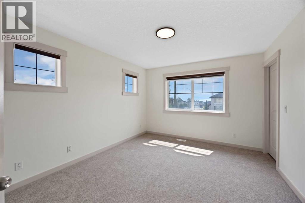 130 Panamount Road NW, Calgary, Alberta  T3K 0H6 - Photo 30 - A2333016