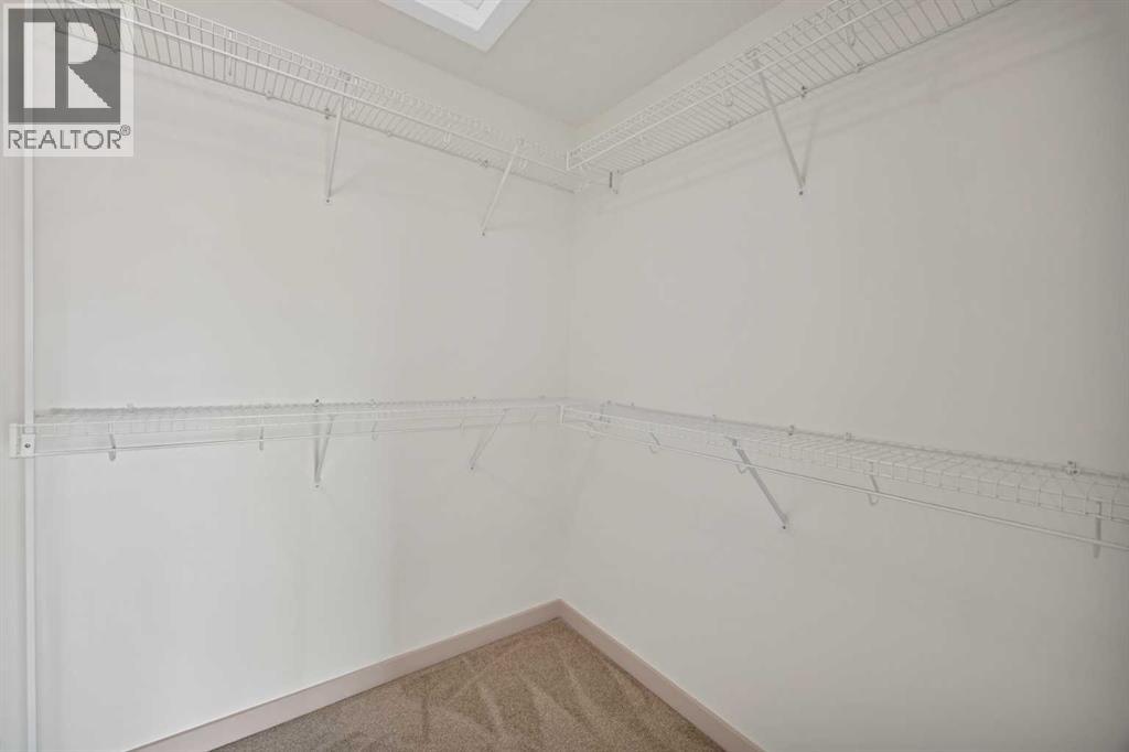 130 Panamount Road NW, Calgary, Alberta  T3K 0H6 - Photo 26 - A2333016