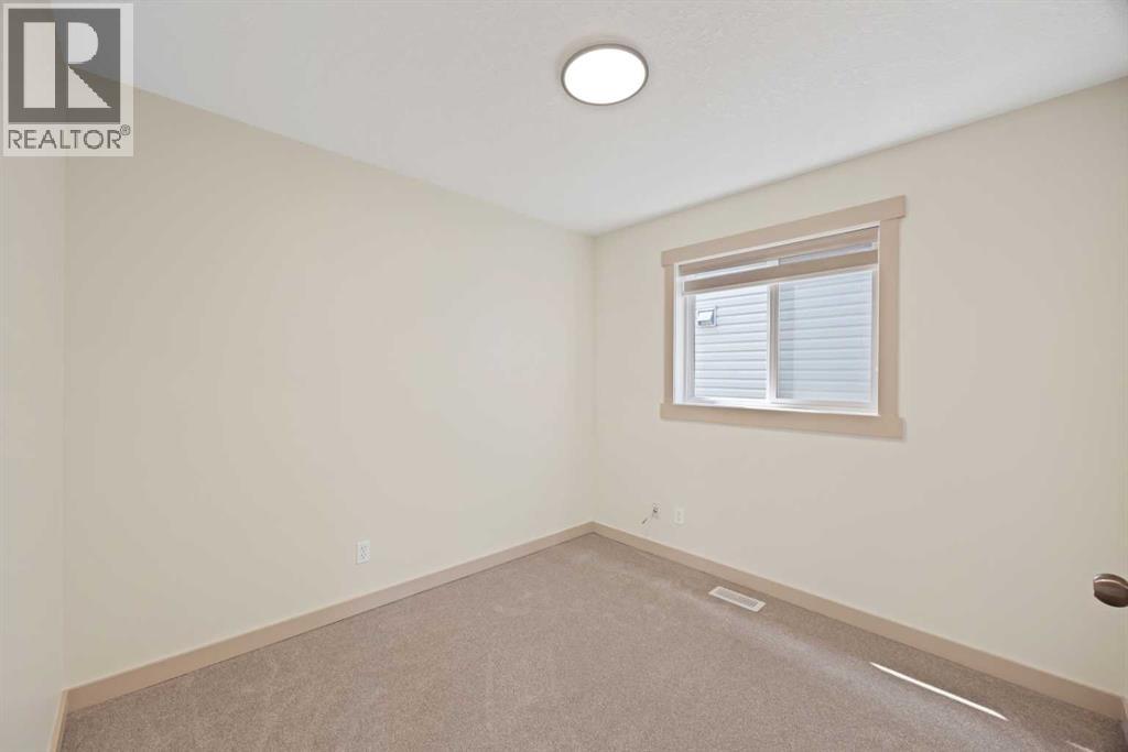 130 Panamount Road NW, Calgary, Alberta  T3K 0H6 - Photo 10 - A2333016