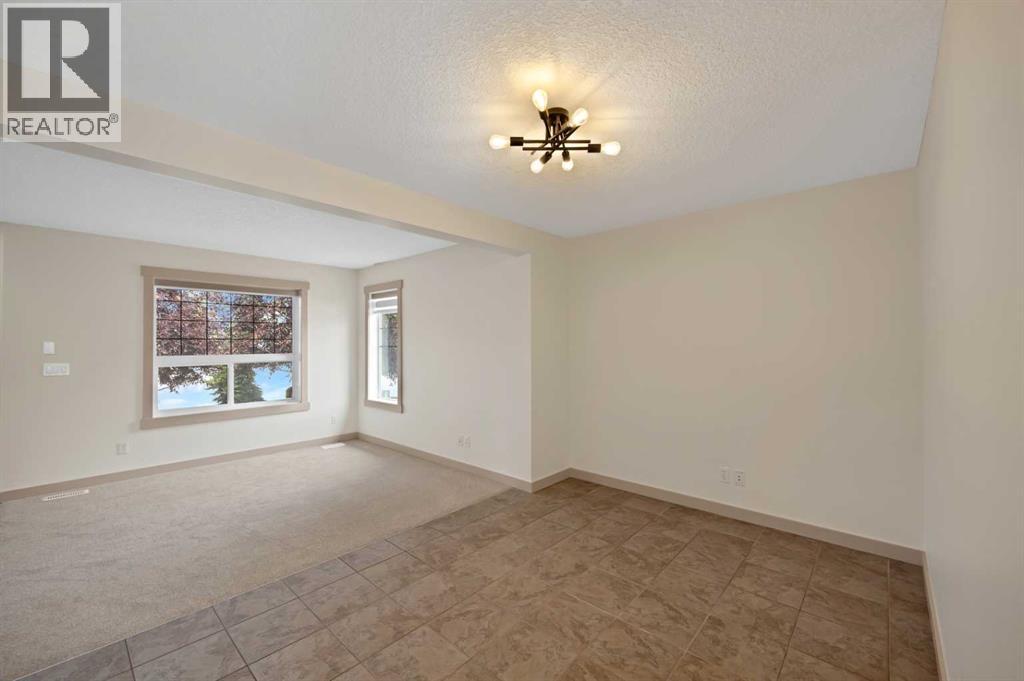 130 Panamount Road NW, Calgary, Alberta  T3K 0H6 - Photo 13 - A2333016