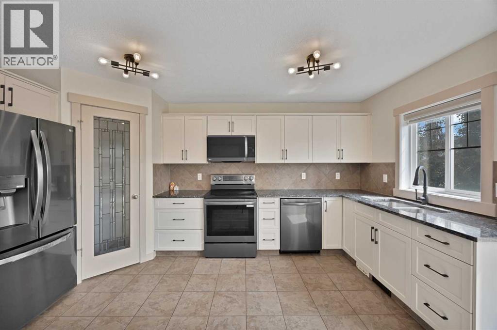 130 Panamount Road NW, Calgary, Alberta  T3K 0H6 - Photo 19 - A2333016