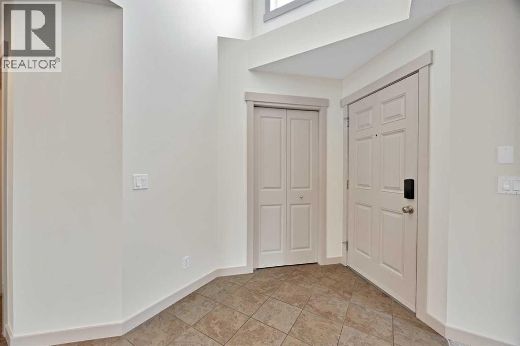 130 Panamount Road NW, Calgary, Alberta  T3K 0H6 - Photo 7 - A2333016