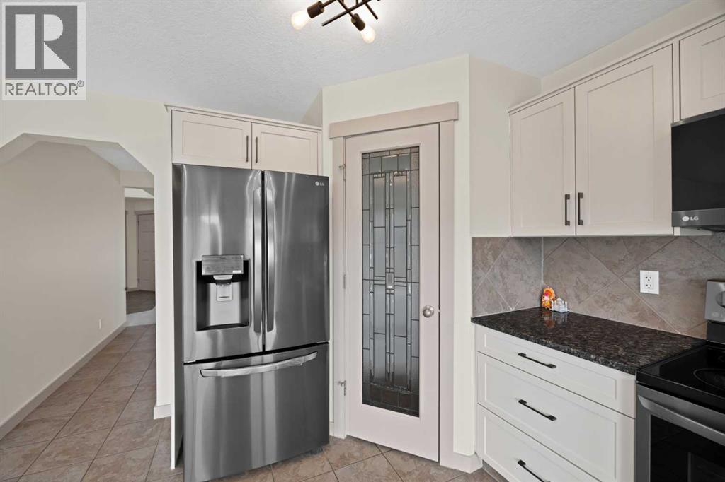 130 Panamount Road NW, Calgary, Alberta  T3K 0H6 - Photo 17 - A2333016