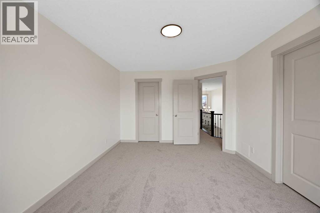 130 Panamount Road NW, Calgary, Alberta  T3K 0H6 - Photo 22 - A2333016
