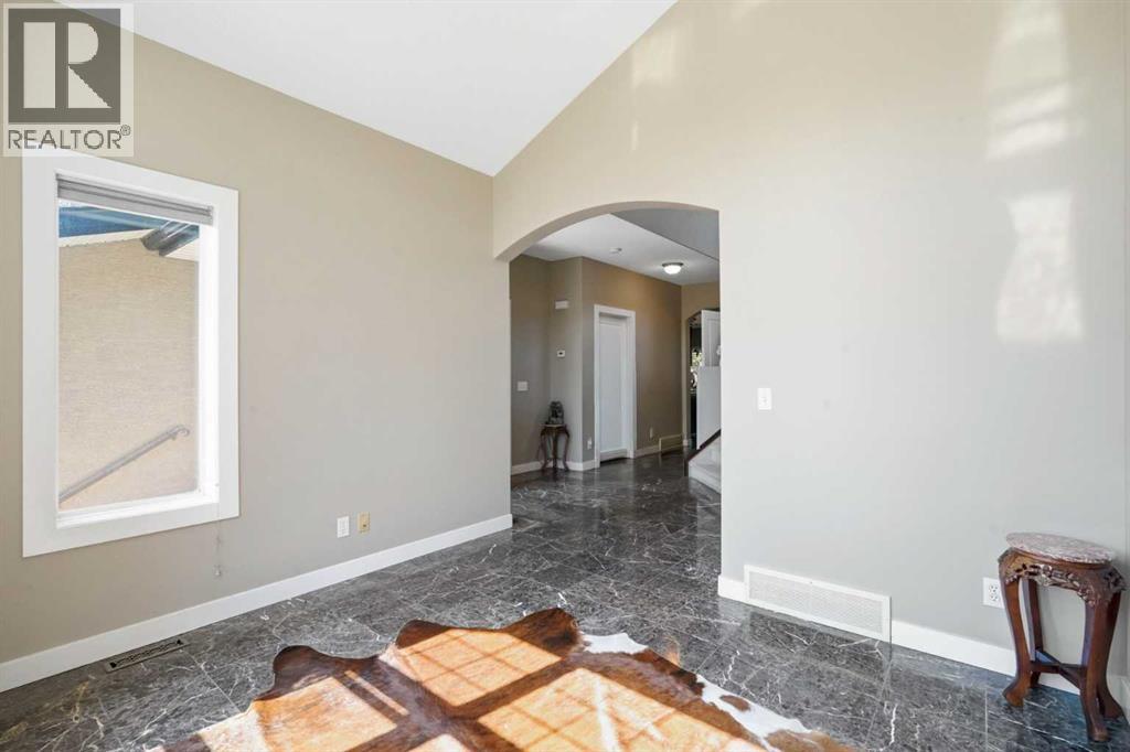 242 Tusslewood Grove NW, Calgary, Alberta  T3L 2Y4 - Photo 6 - A2333386
