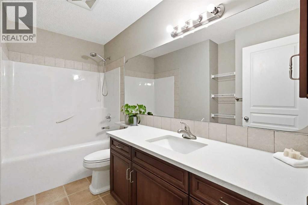 242 Tusslewood Grove NW, Calgary, Alberta  T3L 2Y4 - Photo 23 - A2333386